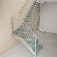 Escalier moderne en métal avec marches en verre trempé, garde-corps en verre, design droit pour usage intérieur, services personnalisés, garantie de 5 ans