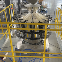 Peseuse multi-têtes avec machine d'emballage Machine à emballer les noix, les copeaux, les granulés et les sacs.