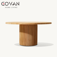 Table de salle à manger ronde en teck artisanal pour extérieur, résistante aux UV et imperméable, idéale pour hôtel et terrasse en plein air
