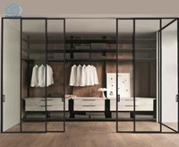 Portes pliantes intérieures modernes en aluminium noir ultra-minces multi-panneaux, résistantes à l'eau, avec verre entièrement transparent, pour appartement, villa, placard