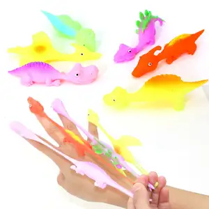 Venta caliente creativo TPR suave pegajoso dedo elástico unicornio volador tirachinas cápsula juguetes para niños