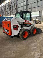Chargeur frontal d'occasion d'origine pour moteur Kubota S550, faible nombre d'heures, matériel de construction fiable, 2023, capacité de charge nominale de 3 tonnes