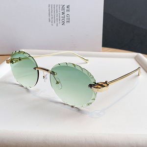 Retro Round <b>Rimless</b> <b>Sunglasses</b> UV400 Unisex Sun Protection Adult Fashion Green Lenses - Product Image 1