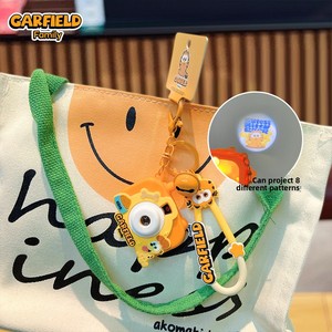 Venta al por mayor regalo genuino para <span class=keywords><strong>Garfield</strong></span> cámara de goma llavero colgante lindo estudiante de dibujos animados mochila decoración exquisita - Product Image 5