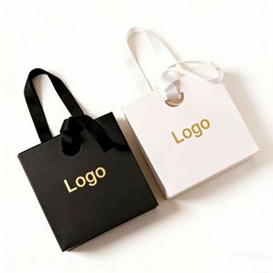 Custom Luxury <b>Small</b> Boutique Luxury Cardboard Gift Packaging Paper <b>Bag</b> and Jewelry Packaging Paper <b>Bag</b> With Ribbon Handle - Product Image 1