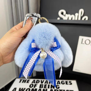 Petit lapin en peluche mignon, imitation lapin mort, pendentif porte-clés nœud <span class=keywords><strong>papillon</strong></span>, poupée en fausse fourrure d'otter, décoration de <span class=keywords><strong>sac</strong></span> - Product Image 1