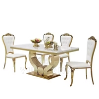 Ensemble de table à manger moderne Offre Spéciale avec plateau en marbre noir et cadre en acier inoxydable doré pour maison, villa, appartement ou hôtel