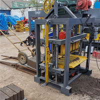 QT40-2 jamaïcain qt automatique presse hydraulique machine de fabrication de blocs de chaussée moteur vibrant bétonnière prix népal pour la guinée