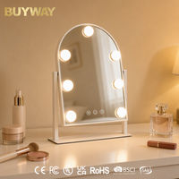 Miroir de maquillage blanc en forme d'arche avec sept ampoules à bulbe et double support inclinable, miroir de vanité LED de table