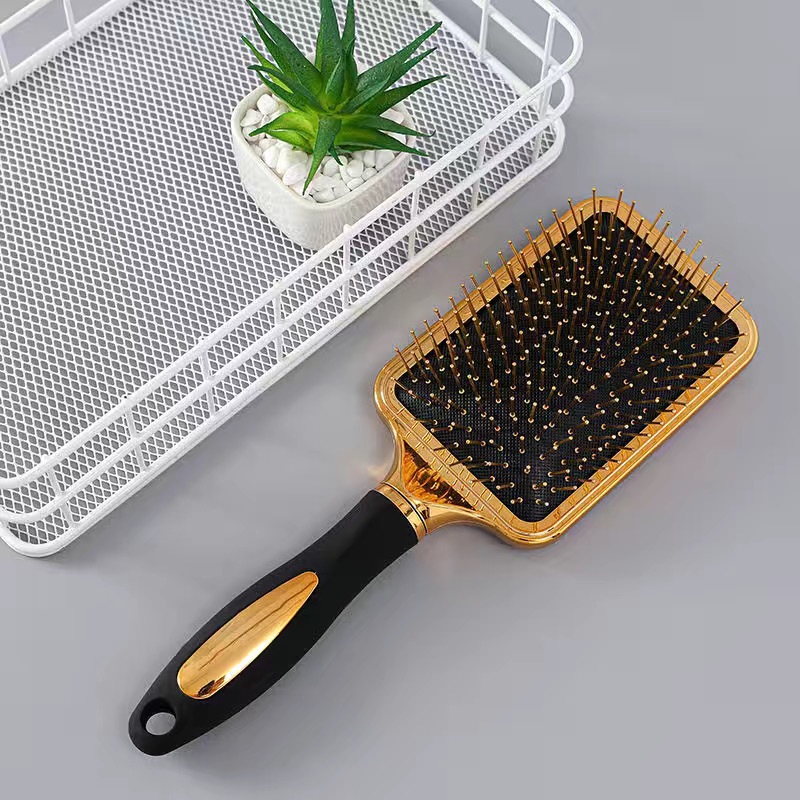 #1 Brosse à cheveux électrique