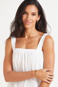 ชุดเดรสยาวปานกลางสีขาวผ้าลินินผสมผ้าฝ้ายสองชั้นจีบระบายไหล่เฉียงสำหรับผู้หญิง ฤดูใบไม้ผลิ 2023 - Product Image 4