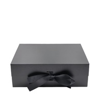 Boîte cadeau magnétique pliable haut de gamme avec doublure en éponge, emballage en carton en forme de livre, ruban, impression UV, gaufrage, dossiers