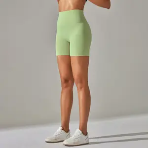 2024 Oem Logo mujeres pantalones cortos para correr transpirable de lujo de cintura alta adelgazante firme banda elástica melocotón glúteos pantalones cortos de motorista