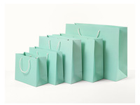 Alibabab Guarantee Sac d'emballage en papier kraft avec poignée pour supermarché au détail Cadeau Stock Shopping commercial