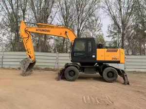 Excavatrice sur pneus Hyundai d'occasion de 21 tonnes, modèle 210W-7, fabriquée en Corée, modèle 2021, avec moteur, pompe à engrenages et moteur électrique - Product Image 1