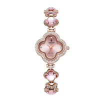 Nouvelle montre-bracelet pour femme 2025, trèfle à quatre feuilles, 26 mm, résistante à l'eau 30 m, mouvement à quartz, cristal en forme de pétale