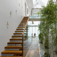 Escalier flottant sans poteaux, entièrement dissimulé dans le mur, escalier cantilever intérieur