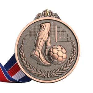 Vente en gros de médailles sportives de football en alliage de zinc or argent Bronze fournitures scolaires trophée de la coupe de football américain et médailles