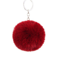 Porte-clés en fourrure en gros, forme de boule, pompon vert