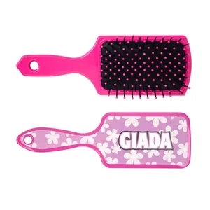 Cepillo para el cabello Giada para bebés, color rosa con diseño floral y cerdas suaves - Product Image 1