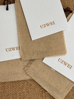 Ensemble de trois étiquettes personnalisées pour vêtements avec étiquette en papier coton et cordon marron pour les marques de vêtements