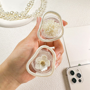 เคสโทรศัพท์มือถือรูปทรงพิเศษสไตล์เกาหลีประดับมุกวงกลมลายดอกไม้ พร้อมที่จับแบบยืดหดได้และถุงลมนิรภัยแบบยึดติดด้วยกาวพลาสติก - Product Image 1