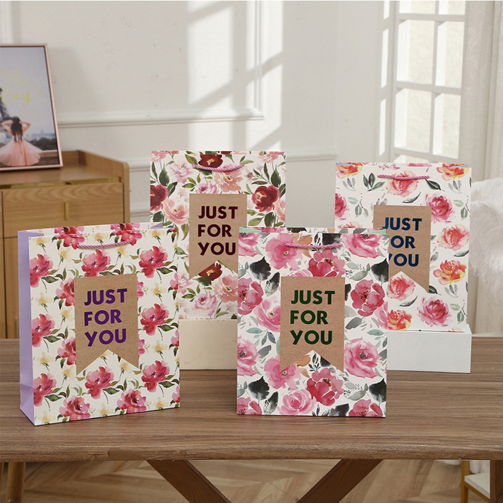 Fashion Stock Gift Paper Bag With Color Gold Stamping And Flower Printed Durable White Card Paper Bags For Gifts Packaging