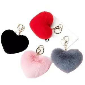 Porte-clés pompon en fausse fourrure de lapin pour femmes, accessoire en forme de cœur, idéal pour l'hiver, nouvelle collection