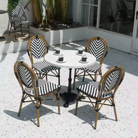 Ensemble de table à manger ronde moderne avec structure en métal, mobilier pour café, restaurant, usage commercial