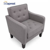 Fauteuil simple rembourré minimaliste en tissu aspect lin doux, accoudoirs incurvés, dossier capitonné, pieds en bois robustes