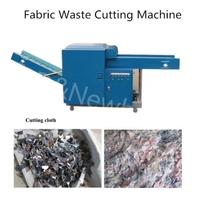 Coupe-fibres industriel à mouvement alternatif avec grande bouche d'alimentation pour la découpe de déchets textiles en vrac