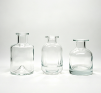 Bouteille diffuseur en verre vide transparente pour huiles essentielles avec bouchon à vis et sérigraphie – Vente en gros