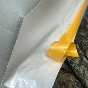 Bolsa de Embalaje para Ropa Impermeable Xin Yue Gris, Papel Kraft Compuesto Tejido, Ecológico y Moderno para Suéteres - Product Image 4