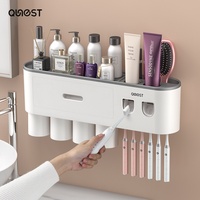 Presse-dentifrice électrique mural Porte-brosse à dents sans poinçon avec rince-bouche en plastique durable Fabricant direct