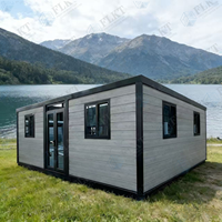 Maison préfabriquée modulaire pliable FLKT à double aile, pour toit plat, robuste, étanche, résistante au vent et au feu, avec salon