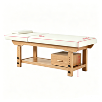 Table de massage professionnelle en bois bleu foncé sur mesure avec coussin de tête et tiroir pour usage en salon de beauté, SPA, hôtel, salle de sport ou salon.