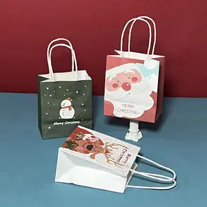 Menerima pesanan khusus tas kertas hadiah pesanan grosir Kraft kertas Natal kustom tas hadiah pernikahan kecil dengan Logo kustom