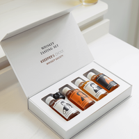 Bouteille de jus recyclable blanche Boîtes en papier rigide magnétique Boîte d'emballage cadeau de bouteille d'épices avec logo personnalisé haut de gamme