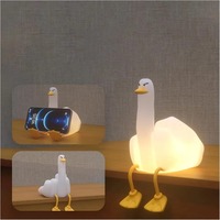 Lampe de chevet LED en silicone en forme de canard mignon de haute qualité, support de téléphone portable, veilleuse LED souple en forme de canard