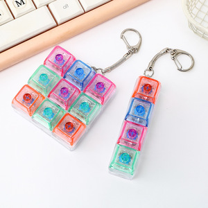 พวงกุญแจรูปทรงสี่เหลี่ยมพร้อมปุ่มกดคลายเครียด 9 ปุ่ม วัสดุ ABS เปลี่ยนสีได้ ของเล่นนิ้วมือ พร้อมห่วงสแตนเลส - Product Image 3