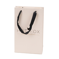Sacs en papier personnalisés de luxe blancs avec logo imprimé sur mesure pour vos achats et cadeaux