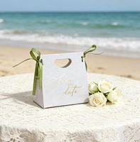 Custom Luxury Eco-Friendly Art Paper Gift Bag with Hot Stamping and Ribbon for Wedding Chocolate Candy Box