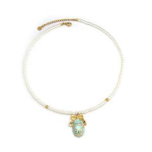Collier de perles avec pendentif coccinelle turquoise en acier inoxydable plaqué or, bijoux durables et résistants - Product Image 1