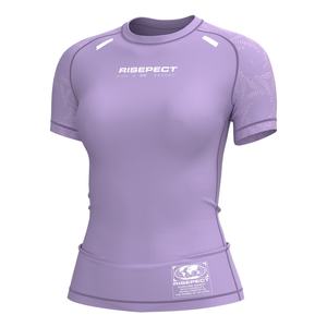 Camiseta de Protección Solar para Mujer con Diseño Exclusivo que Ofrece Comodidad, Protección y un Ajuste Elegante para Actividades Acuáticas y de Artes Marciales - Product Image 1