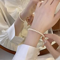 Diseñador clásico, venta al por mayor, cristal de imitación hecho a mano, círculo brillante, pulseras con cuentas de perlas, joyería de moda para mujeres y niñas