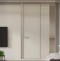 Porte invisible, porte minimaliste en aluminium-bois peignable, porte dissimulée sans cadre intégrée au mur TV du salon