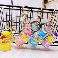 Porte-clés professionnel en acrylique rempli d'huile, mignon en forme de bouteille de glace, avec liquide lumineux, porte-clés liquides personnalisés pour enfants