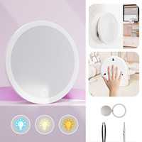 Miroir cosmétique lumineux à écran tactile intelligent personnalisé MoonlitGlow, finition argentée, forme ronde, grossissement de précision, cadre pliable
