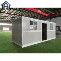 Maison conteneur pliable résistante aux intempéries, cabine modulaire en acier robuste pour la vie en extérieur par tous les temps, le travail et l'hébergement