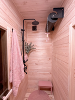 Sauna de luxe en bois préfabriqué modulaire avec revêtement en bois, éclairage ambiant LED et grande fenêtre d'angle en verre